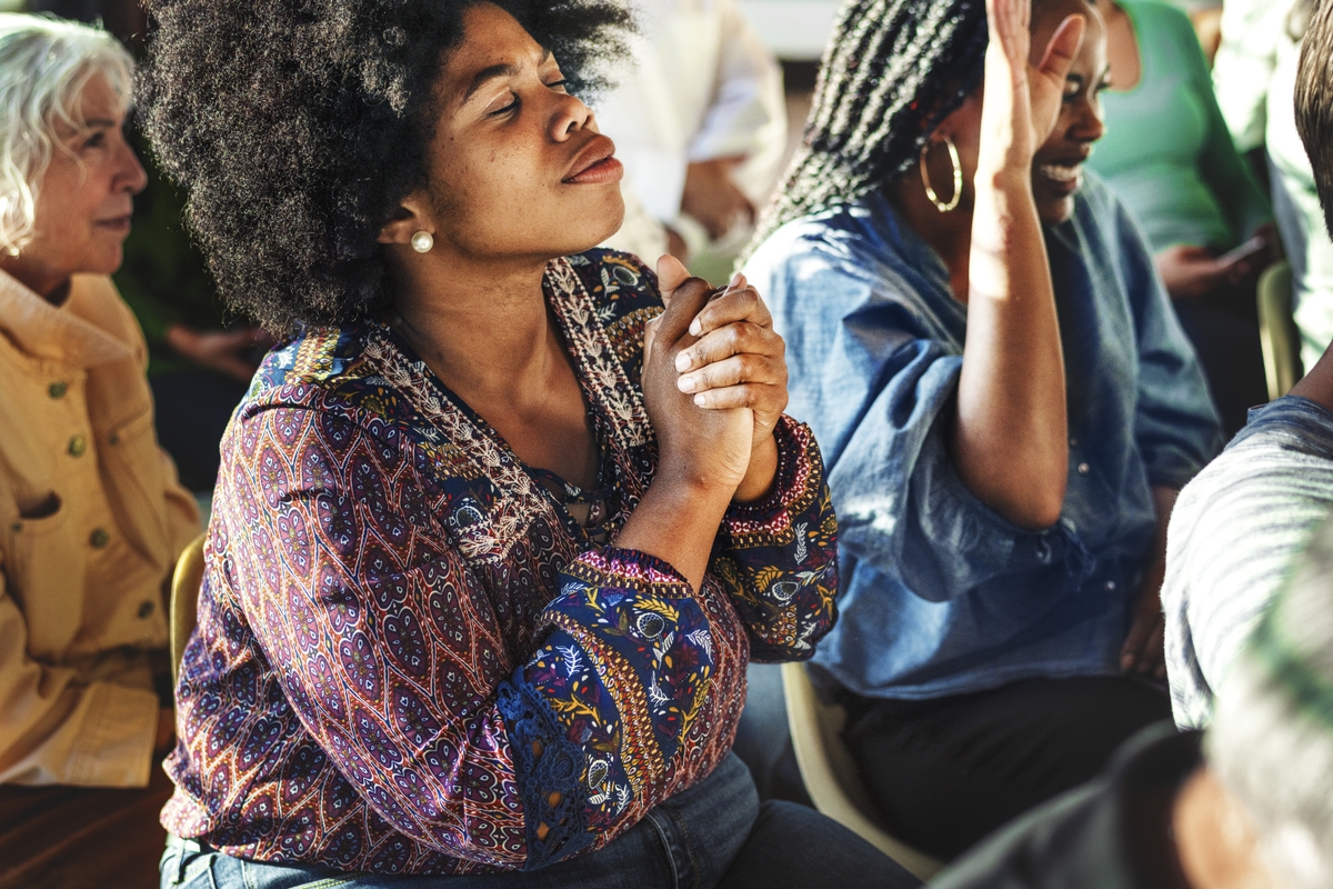 African-American-Woman-with-afro-in-act-of-praising